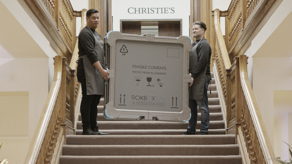 Christie's Art Handlers carry ROKBOX reusable fine art shipping crate