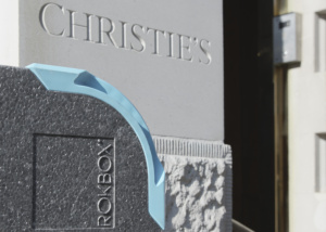 Christie's and ROKBOX logos together announcing a new partnership