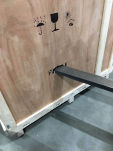Forklift truck damages a fine art wooden shipping crate