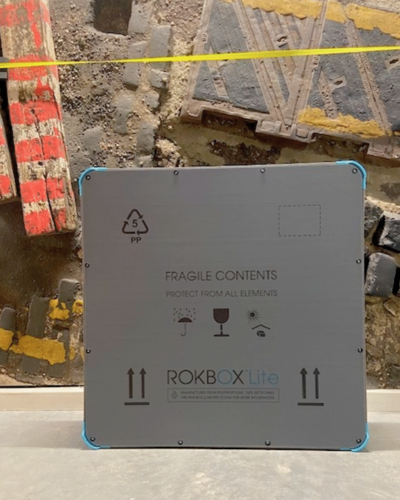 ROKBOX Lite in front of a Boyle family sculpture, at Glasgow Life